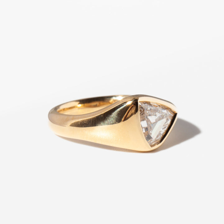 2 carat flow cut lab grown diamond engagement ring in minimal gold setting with antique inspired design