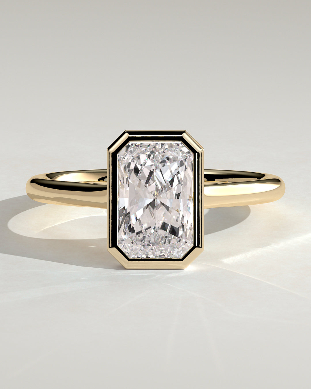 2CT Radiant Bezel Solitaire Engagement Ring featuring an Open Cathedral High Setting