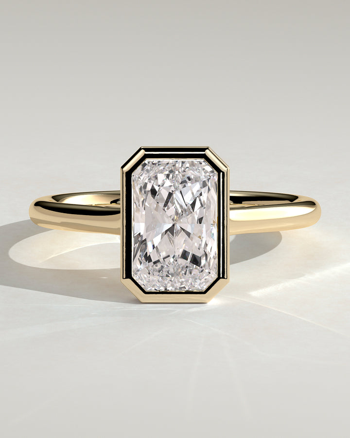 2CT Radiant Bezel Solitaire Engagement Ring featuring an Open Cathedral High Setting