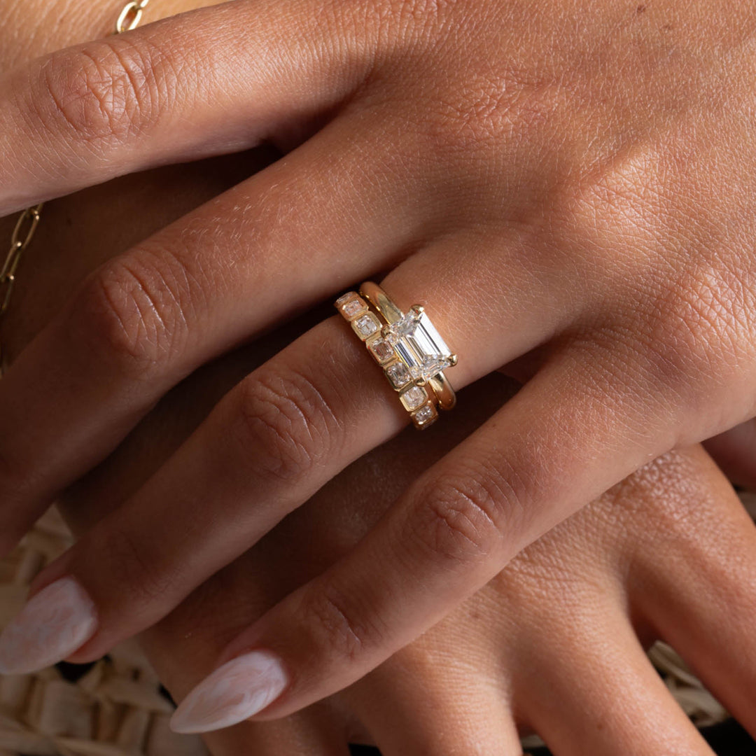 Professional jewelry photography of 2 carat east west emerald cut lab grown diamond solitaire engagement ring