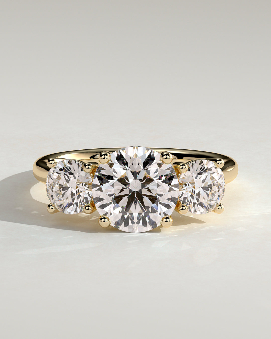 2ct Round Claw Trilogy with Round Side Stones and Trellis Gallery Engagement Ring
