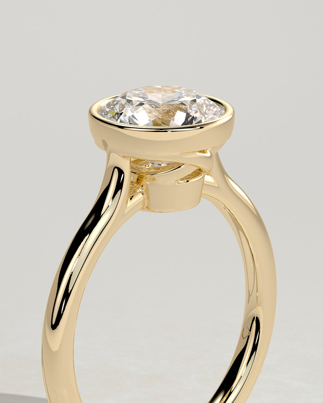 2ct bezel solitaire on hand