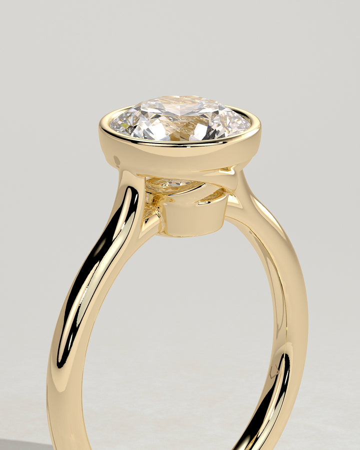 2ct bezel solitaire on hand