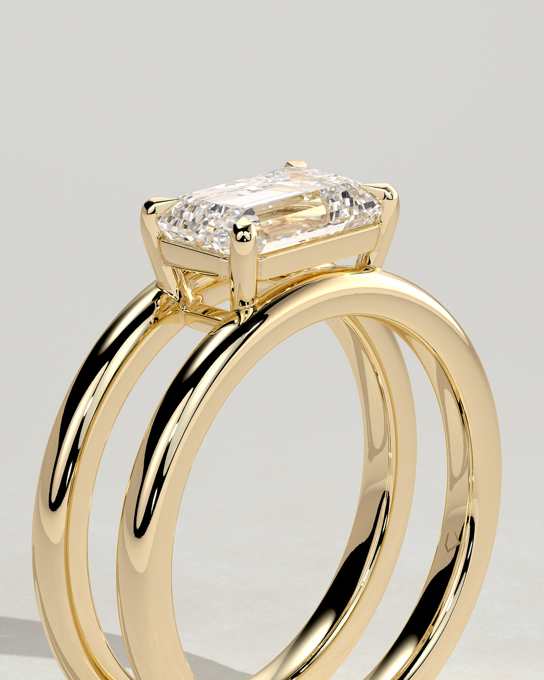 2ct east west emerald engagement ring
