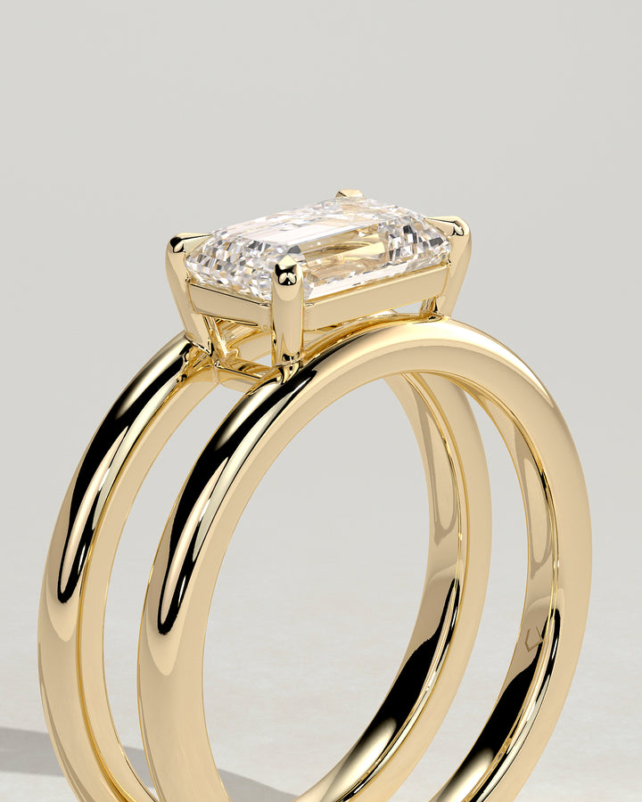 2ct east west emerald engagement ring