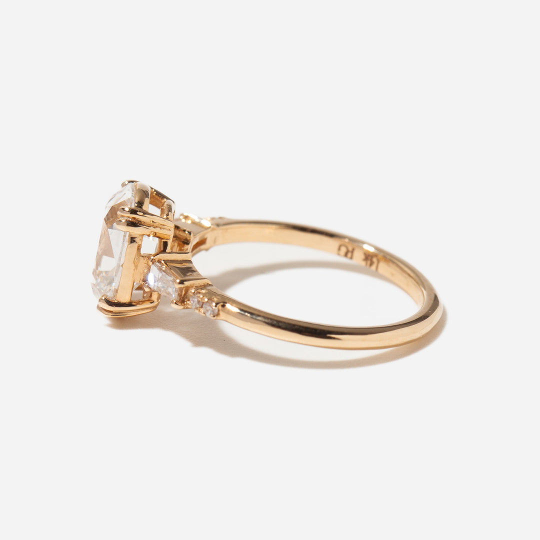 Side profile of elongated cushion lab grown diamond engagement ring featuring pavé set band and vintage-inspired design