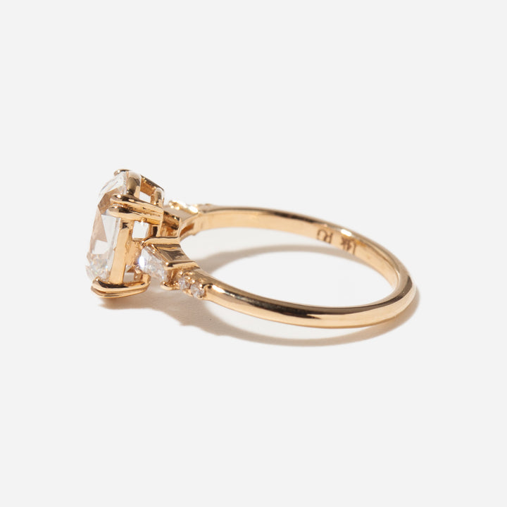 Side profile of elongated cushion lab grown diamond engagement ring featuring pavé set band and vintage-inspired design