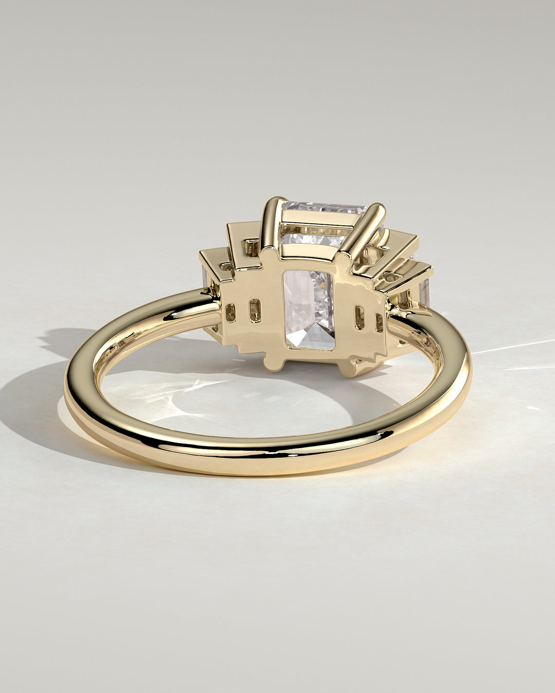 modern emerald cut five stone ring