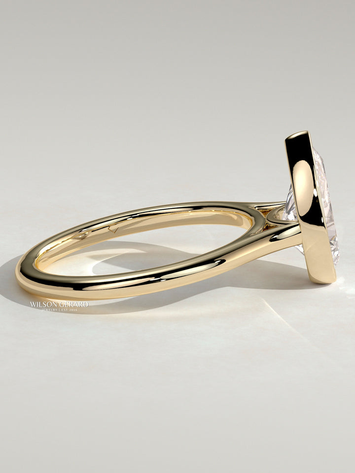 lab grown pear bezel engagement ring