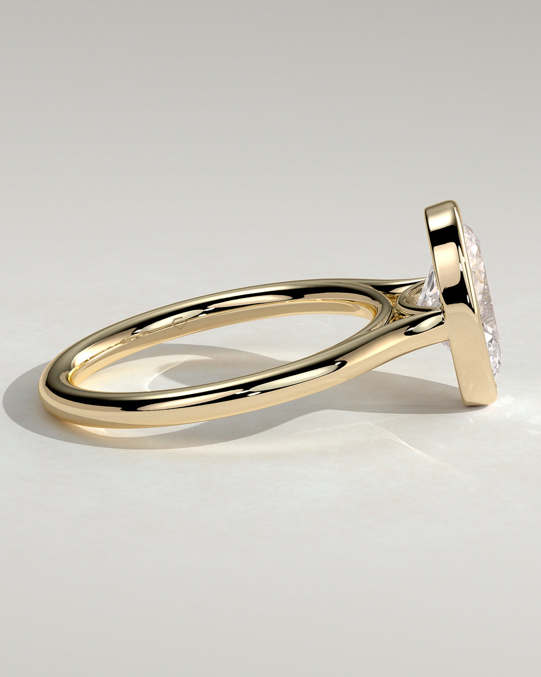 Cathedral bezel solitaire engagement
