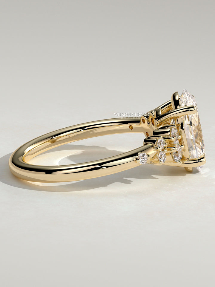modern oval cluster engagement ring