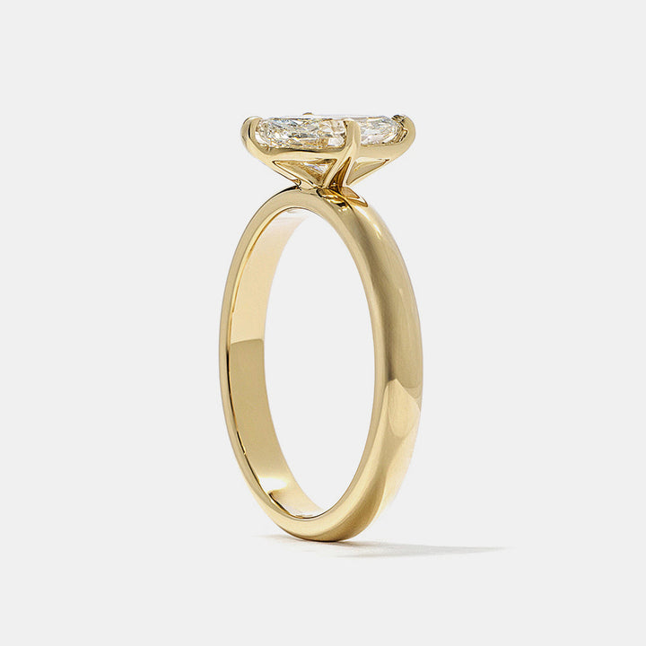 Contemporary marquise lab diamond cigar band solitaire engagement ring featuring sleek minimalist USA bridal design aesthetic
