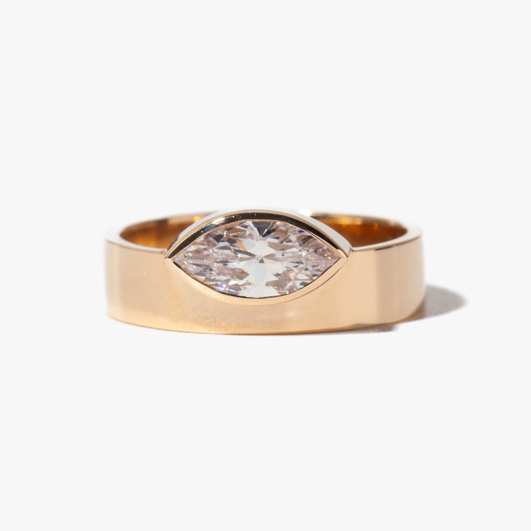 Contemporary east west marquise lab diamond monolith engagement ring featuring minimalist USA bridal design style