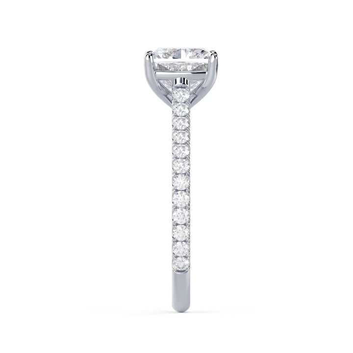 Close-up of a cushion cut lab grown diamond cathedral pave engagement ring highlighting soft square brilliance and pavé detailing