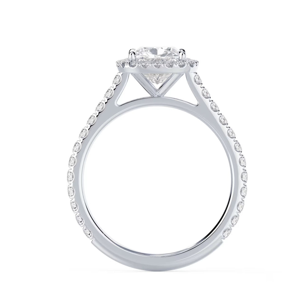 Close-up of a cushion cut lab grown diamond halo cathedral pave engagement ring highlighting soft square brilliance and pavé detailing