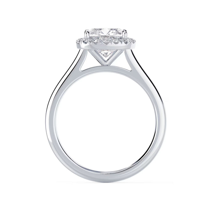 Close-up of an elongated cushion lab grown diamond halo solitaire engagement ring highlighting soft rectangular sparkle