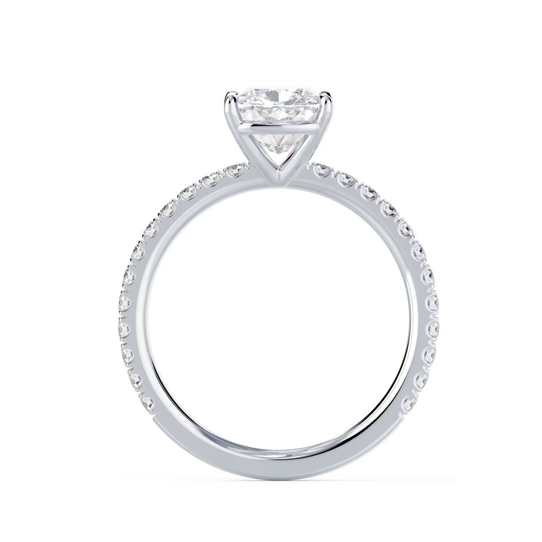 Close-up of a cushion cut lab grown diamond pave engagement ring highlighting soft square sparkle and pavé band detailing
