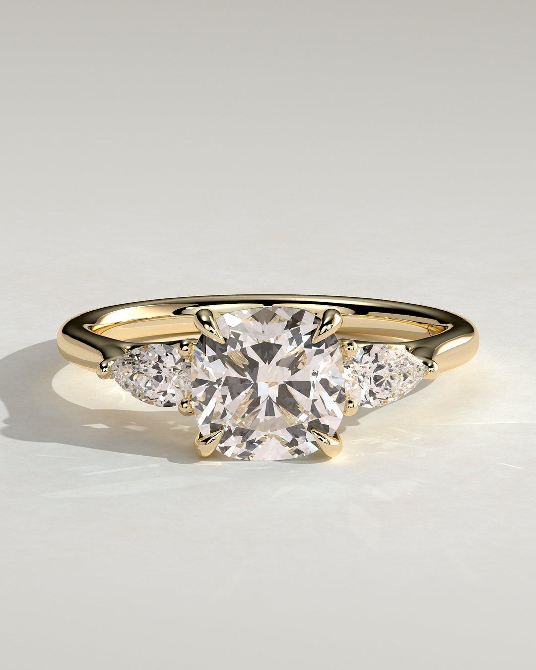 Cushion Cut Trilogy Engagement Ring