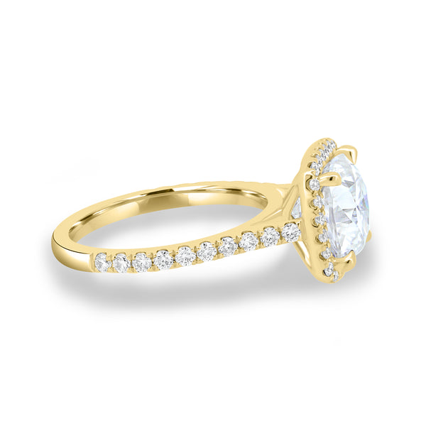 Side profile of cushion lab diamond halo cathedral pavé engagement ring highlighting elevated center stone and pavé band