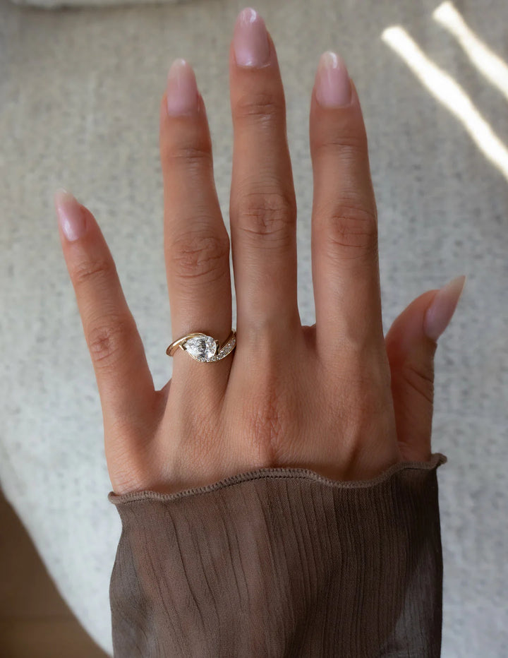 0.50CT-1.50CT Pear East West Lab Grown Tension Style Pave Engagement Ring With Matching Curved Band