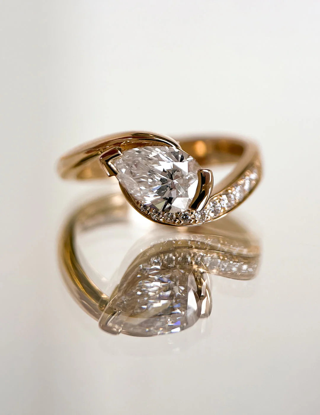 0.50CT-1.50CT Pear East West CVD Diamond By Pass Pave Engagement Ring With Matching Curved Band