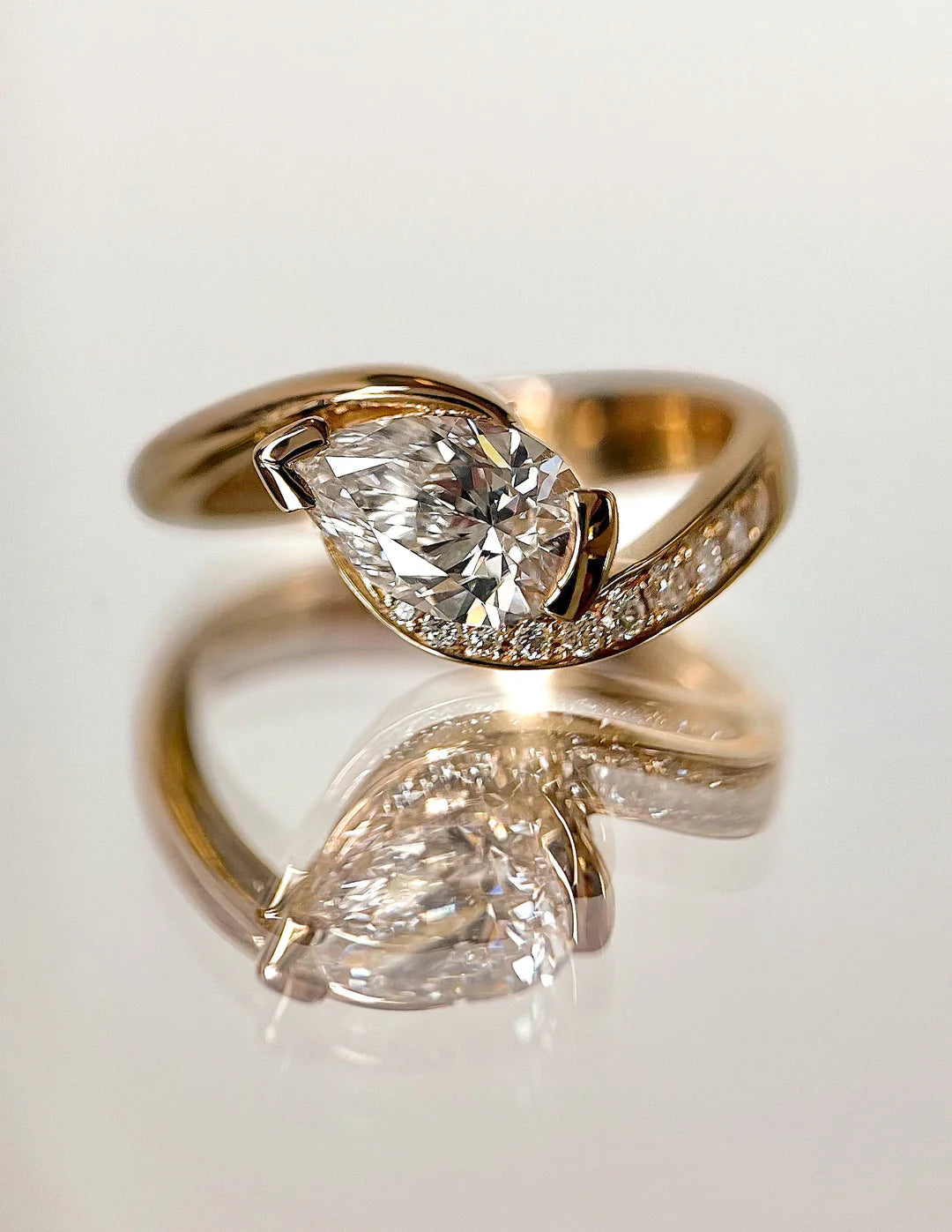 0.50CT-1.50CT Pear East West Lab Grown Tension Style Pave Engagement Ring With Matching Curved Band