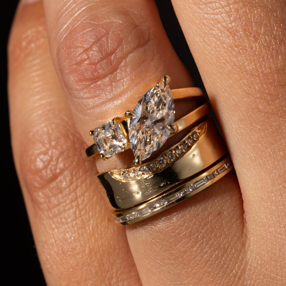 Detailed view of marquise and Asscher cut lab diamond Toi Et Moi engagement ring highlighting contrast and brilliance