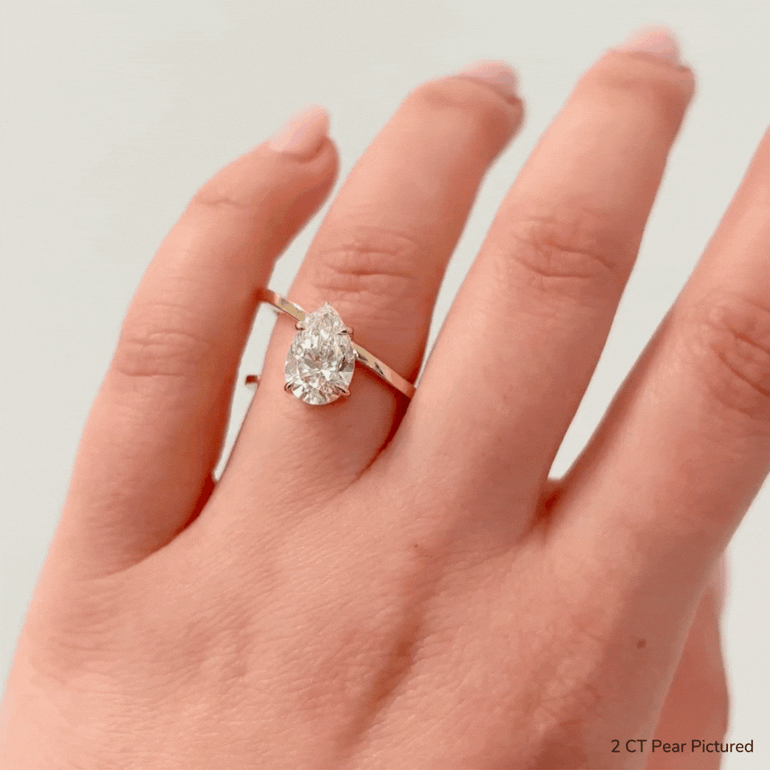 1.0ct Pear Cut Diamond Slant Unique Engagement Ring