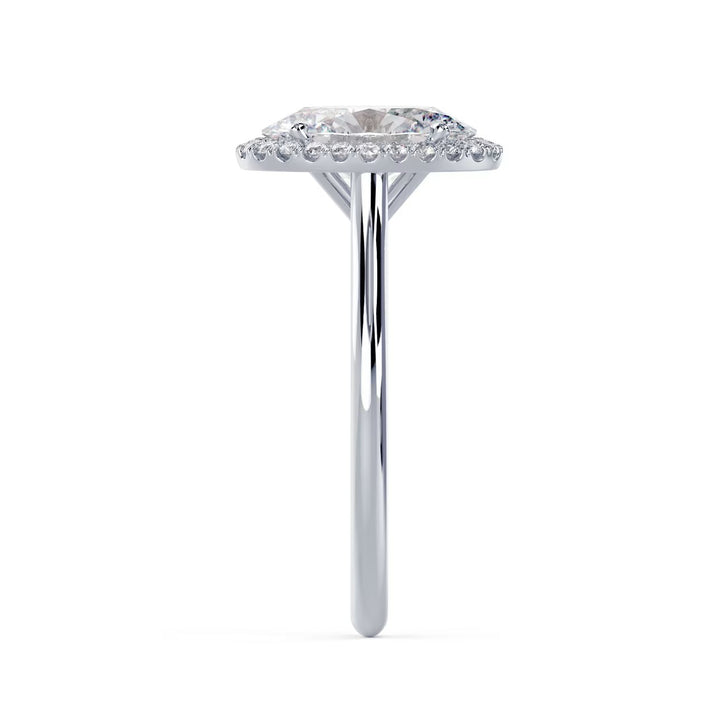 Detailed view of an E VS1 oval cut lab grown diamond halo solitaire engagement ring with elegant symmetry and sparkle