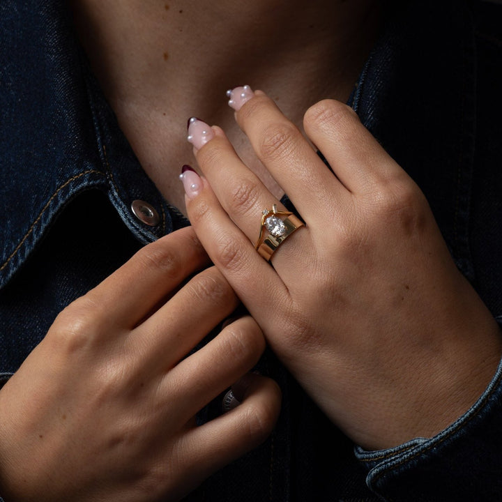 E VS1 oval cut lab grown diamond monolith engagement ring showing crisp clarity and refined minimal structure