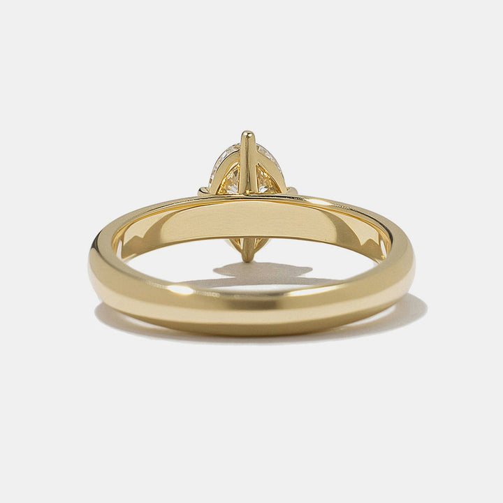 E VS1 oval cut lab grown diamond solitaire engagement ring showing crisp brilliance and minimal setting design