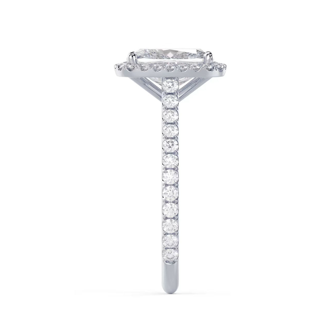 Detailed view of an E VS2 elongated cushion lab grown diamond halo cathedral pave engagement ring with pavé accents