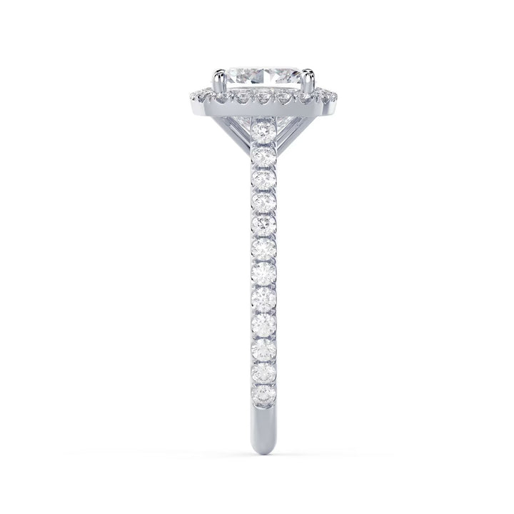 Detailed view of an E VS2 cushion cut lab grown diamond halo cathedral pave engagement ring with elevated structure