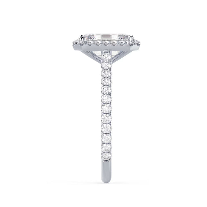 Detailed view of an E VS2 emerald cut lab grown diamond halo cathedral pave engagement ring with elegant rectangular symmetry