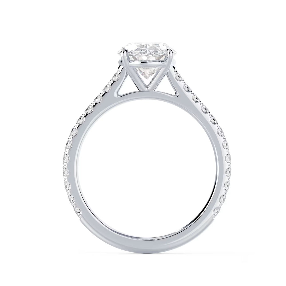 Detailed view of an E VS2 oval cut lab grown diamond cathedral pave engagement ring with elegant elongated shape and clarity