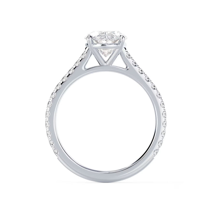 Detailed view of an E VS2 oval cut lab grown diamond cathedral pave engagement ring with elegant elongated shape and clarity