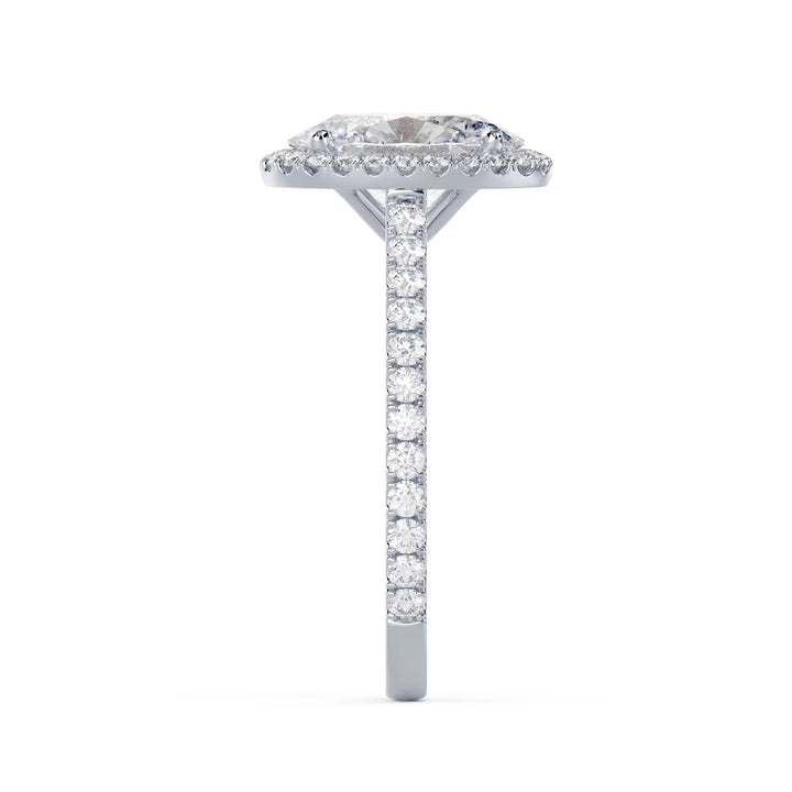 Detailed view of an E VS2 oval cut lab grown diamond halo cathedral pave engagement ring with elegant elongated shape