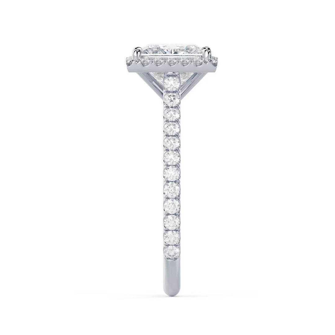 Detailed view of an E VS2 princess cut lab diamond engagement ring with halo and cathedral pave setting