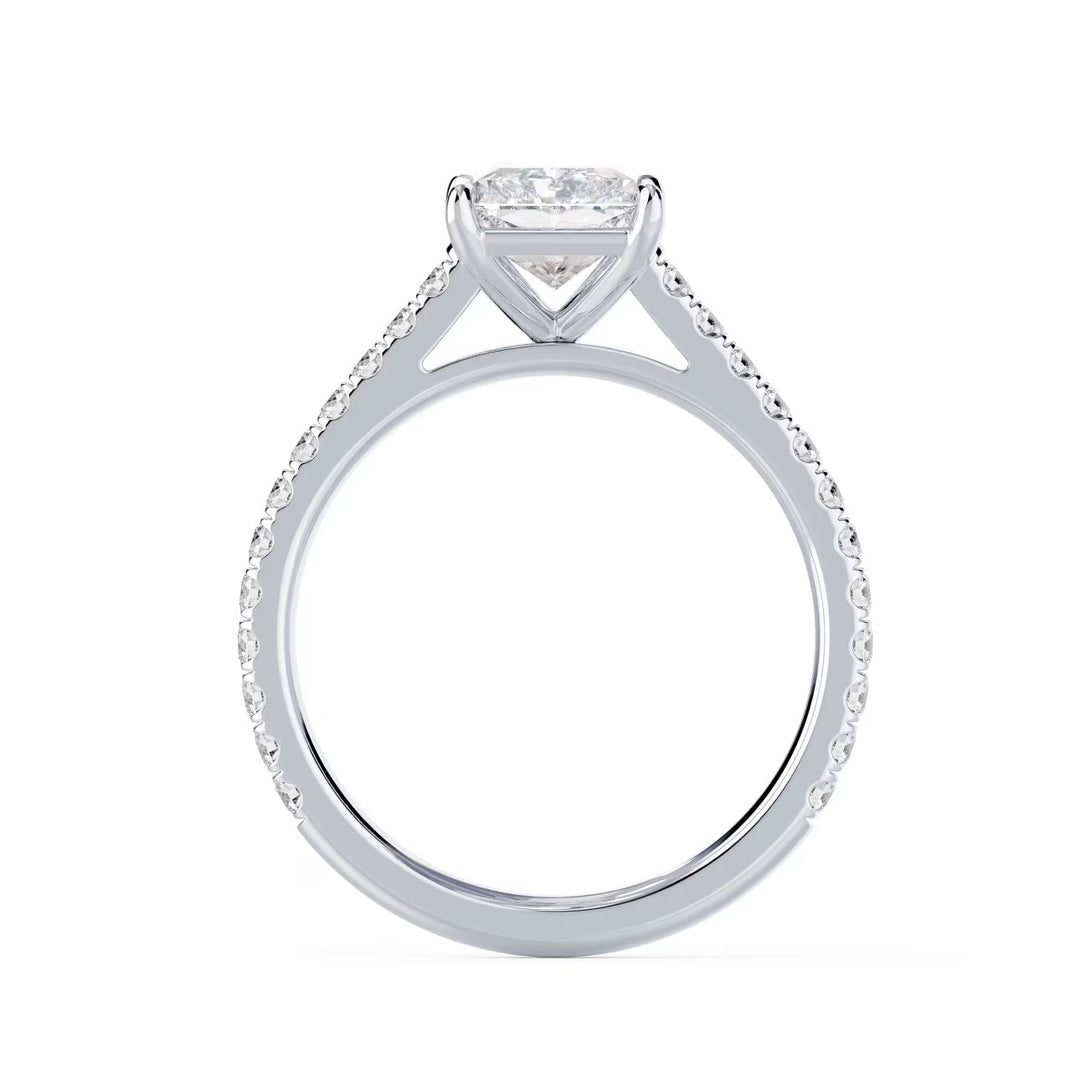 Detailed view of an E VS2 radiant cut lab grown diamond cathedral pave engagement ring with elevated structured setting