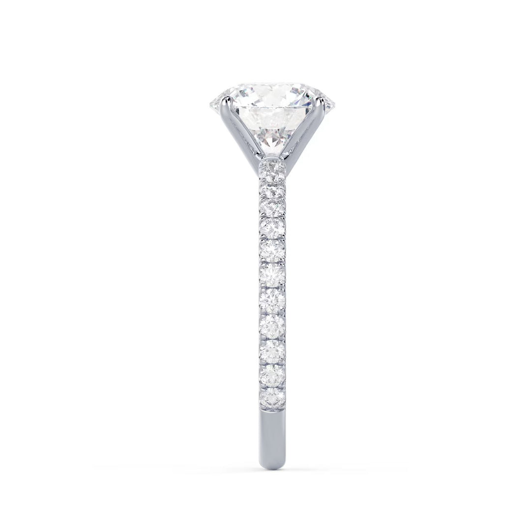 Detailed view of an E VS2 round cut lab grown diamond pave engagement ring with clean symmetry and strong brilliance