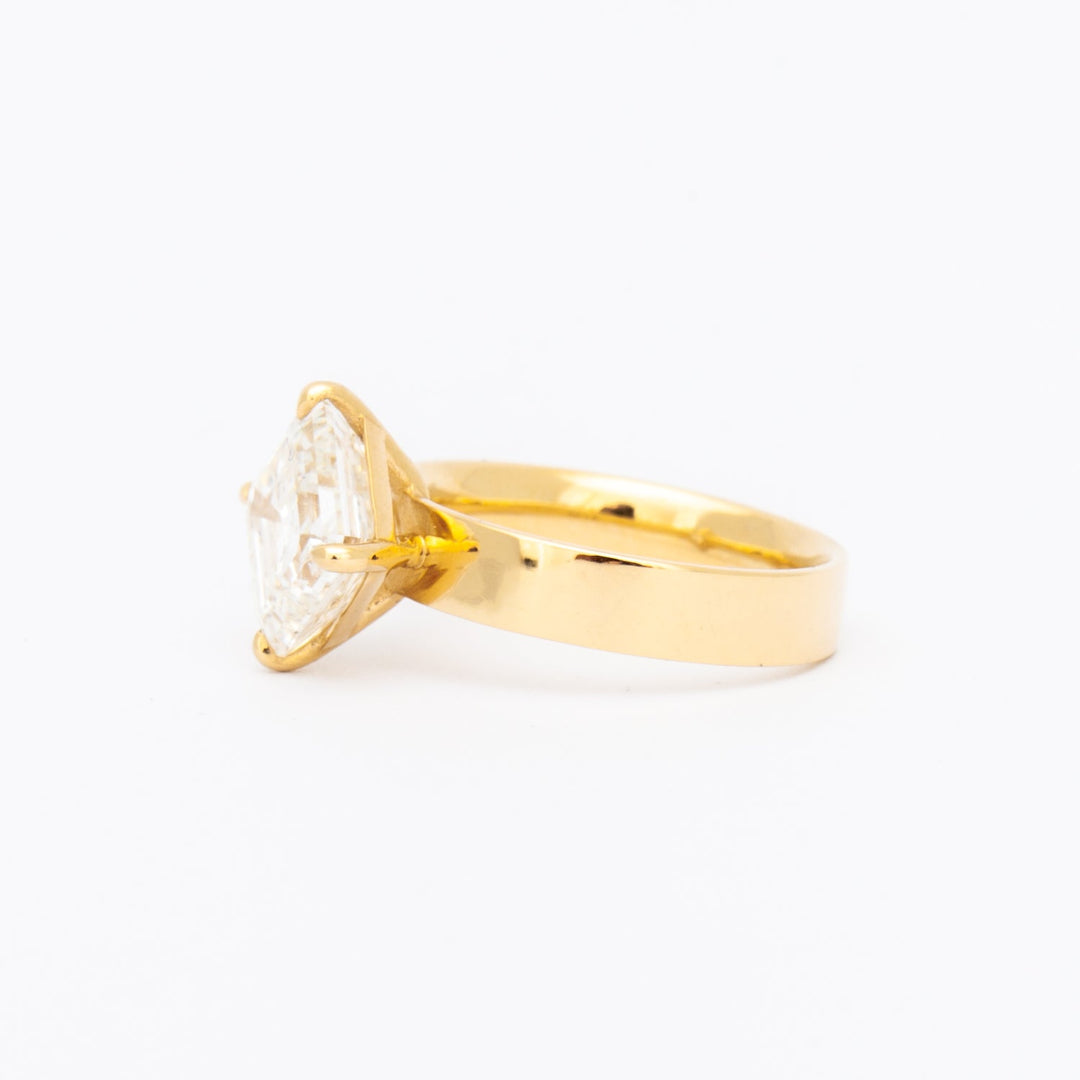 E VS asscher cut lab grown diamond cigar band solitaire engagement ring showing crisp clarity and clean step-cut facets