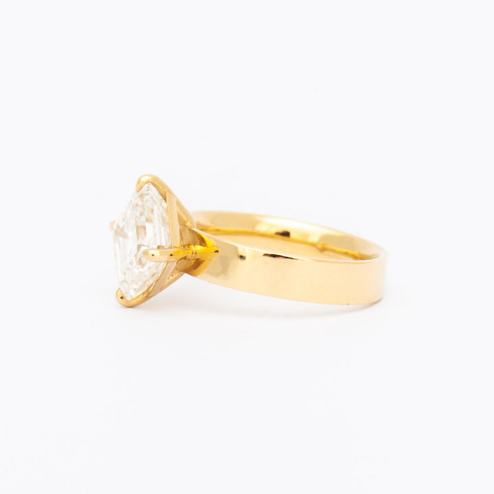 E VS asscher cut lab grown diamond cigar band solitaire engagement ring showing crisp clarity and clean step-cut facets