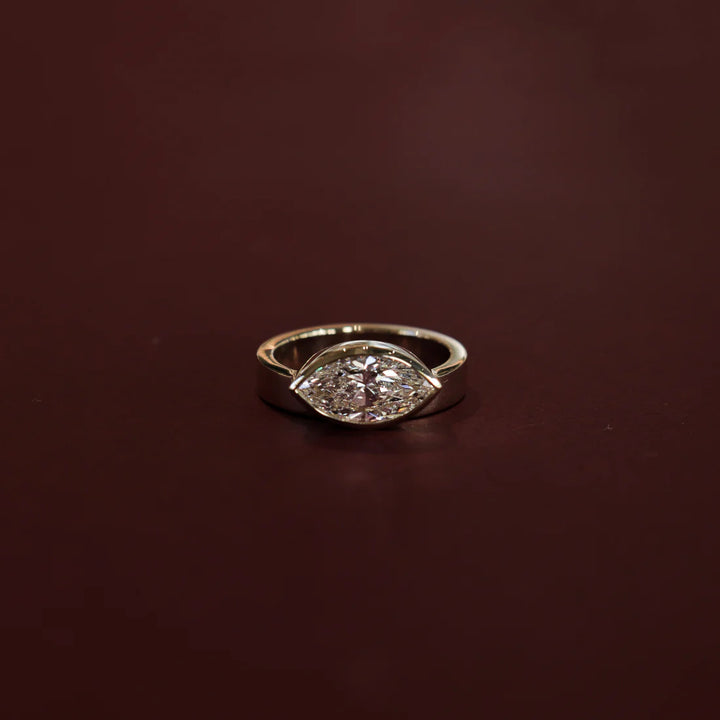 IGI certified marquise bezel engagement ring east west USA
