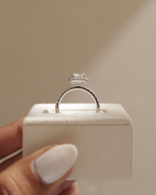 Elegant emerald cut lab grown diamond halo pavé engagement ring with balanced proportions and sophisticated detailing