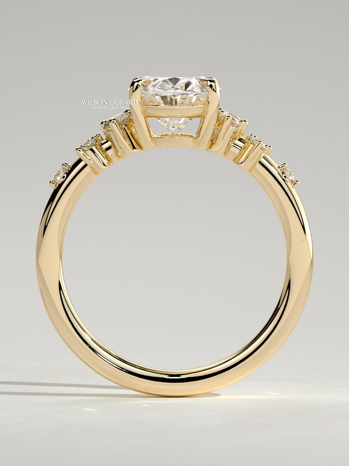 oval solitaire cluster engagement ring