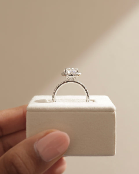 Elegant oval lab grown diamond halo pavé engagement ring with balanced proportions and romantic detailing
