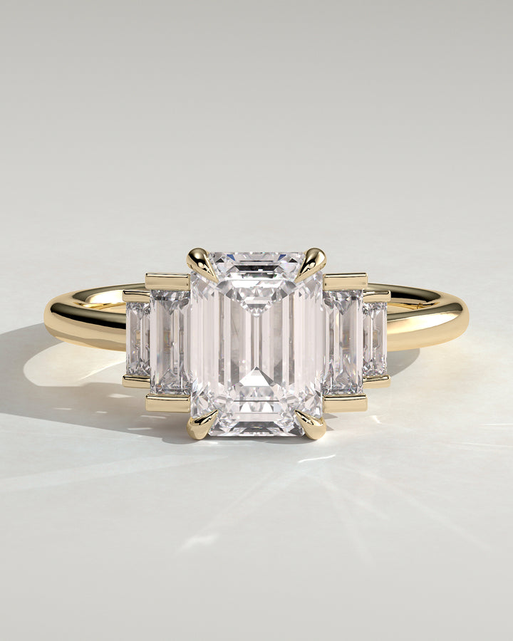 emerald cut five stone diamond ring