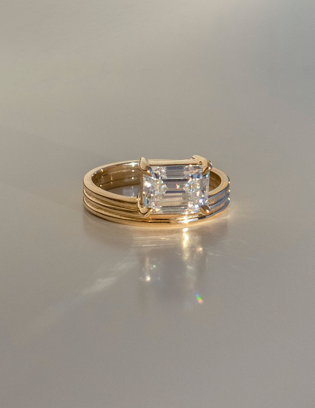 Emerald Solitaire Diamond Ring