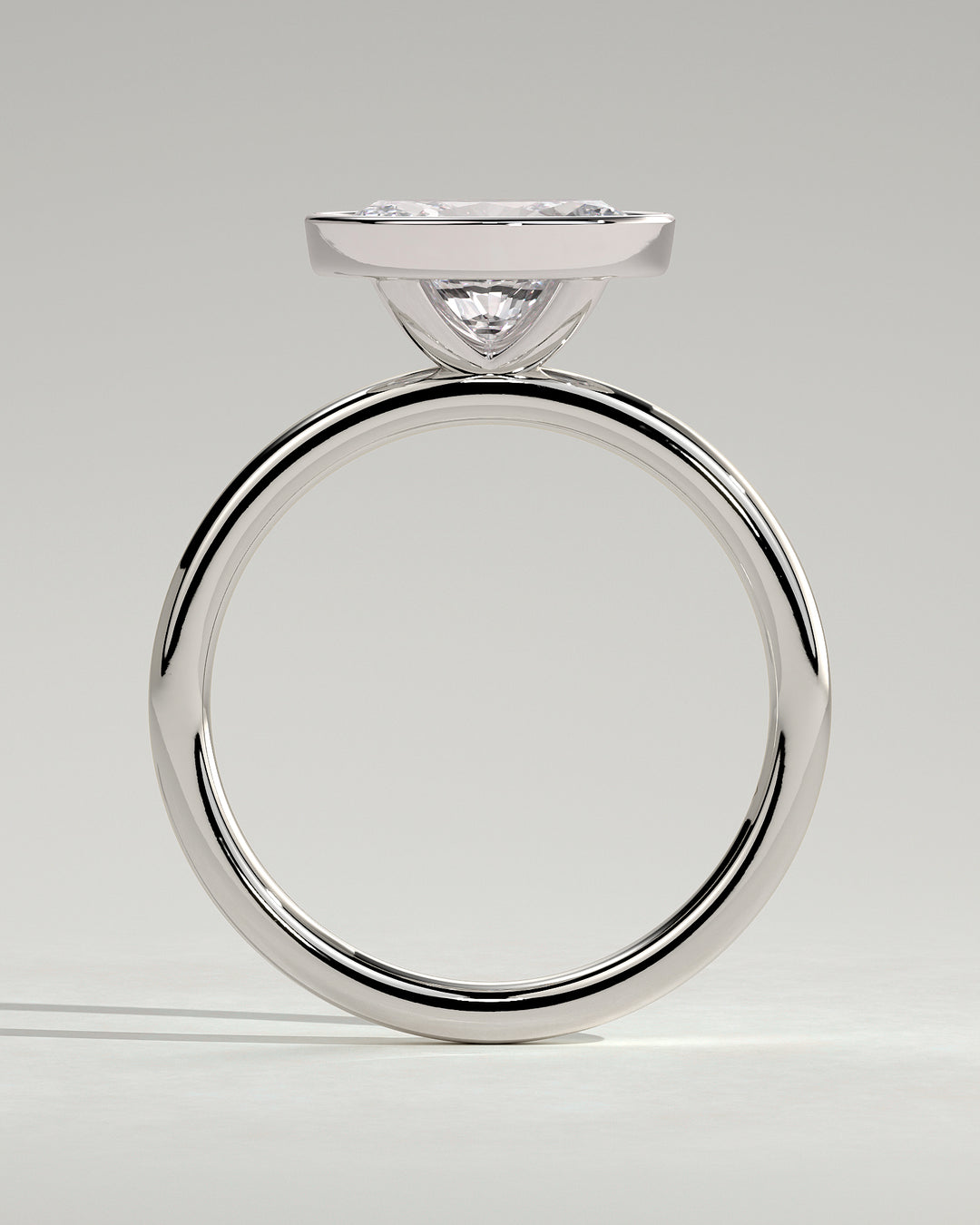 Full bezel diamond solitaire ring 