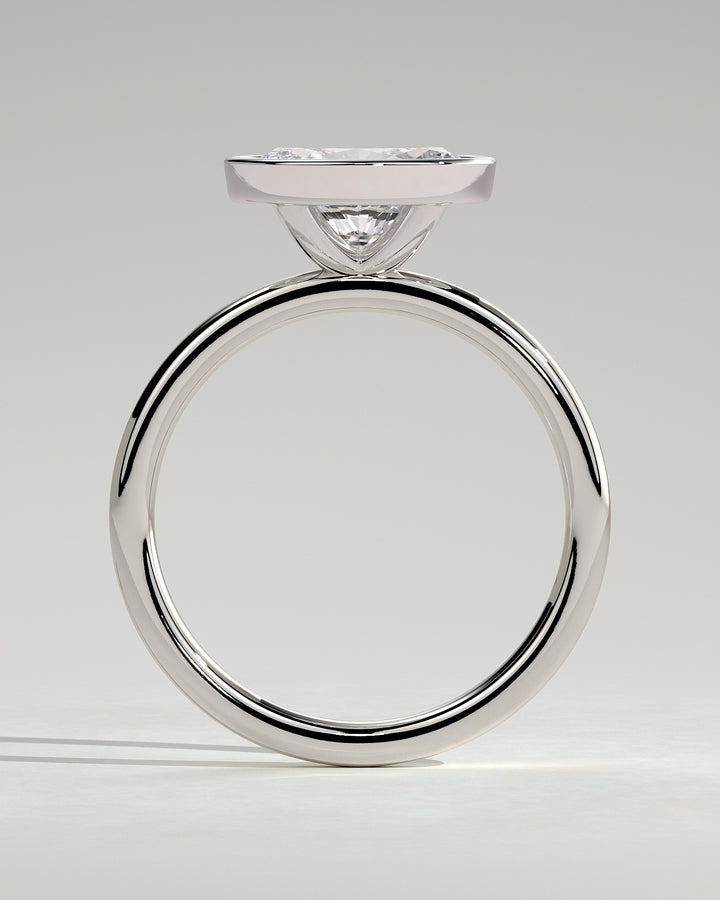 Full bezel diamond solitaire ring 
